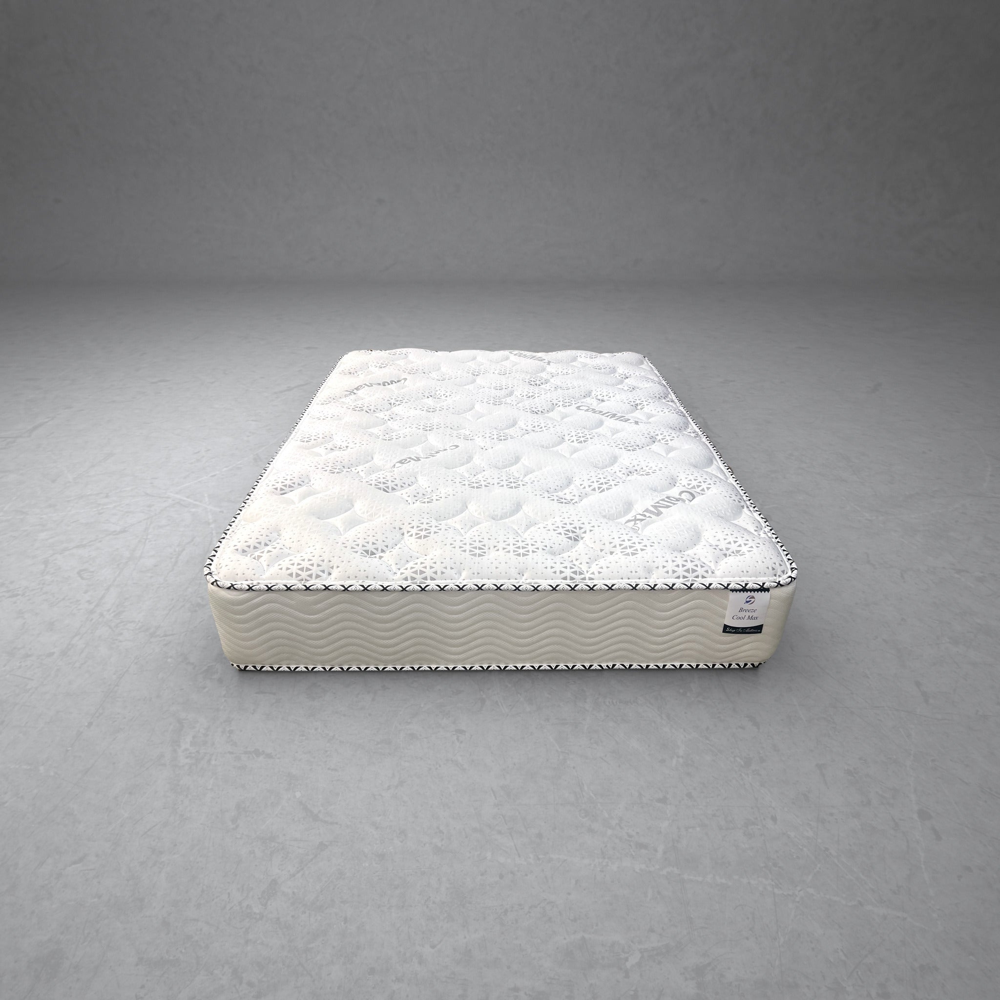 Double Breeze Cool Max 10" Medium Firm Tight top mattress on a concrete background